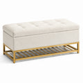 Banc en tissu crème avec base en métal doré